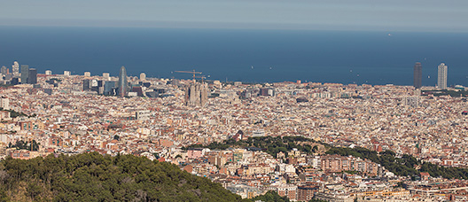 Panoramic view of Barcelona with the sea on the foreground
